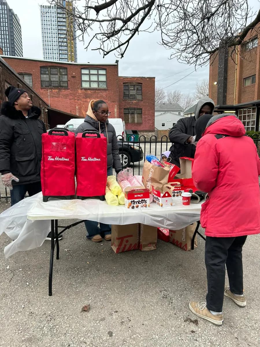 Setting up the donation table with Tim Hortons meals and care packages