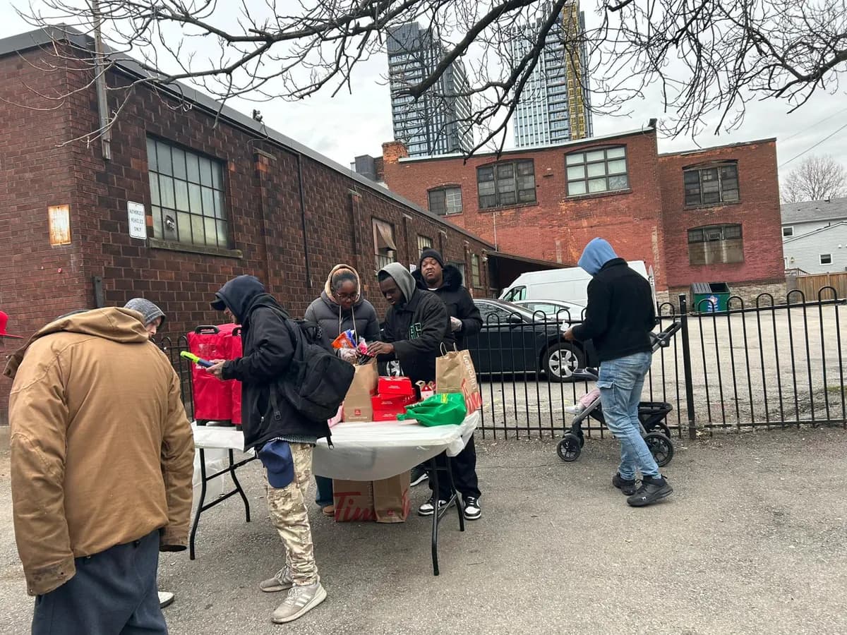 Community members receiving care packages at the Toronto outreach